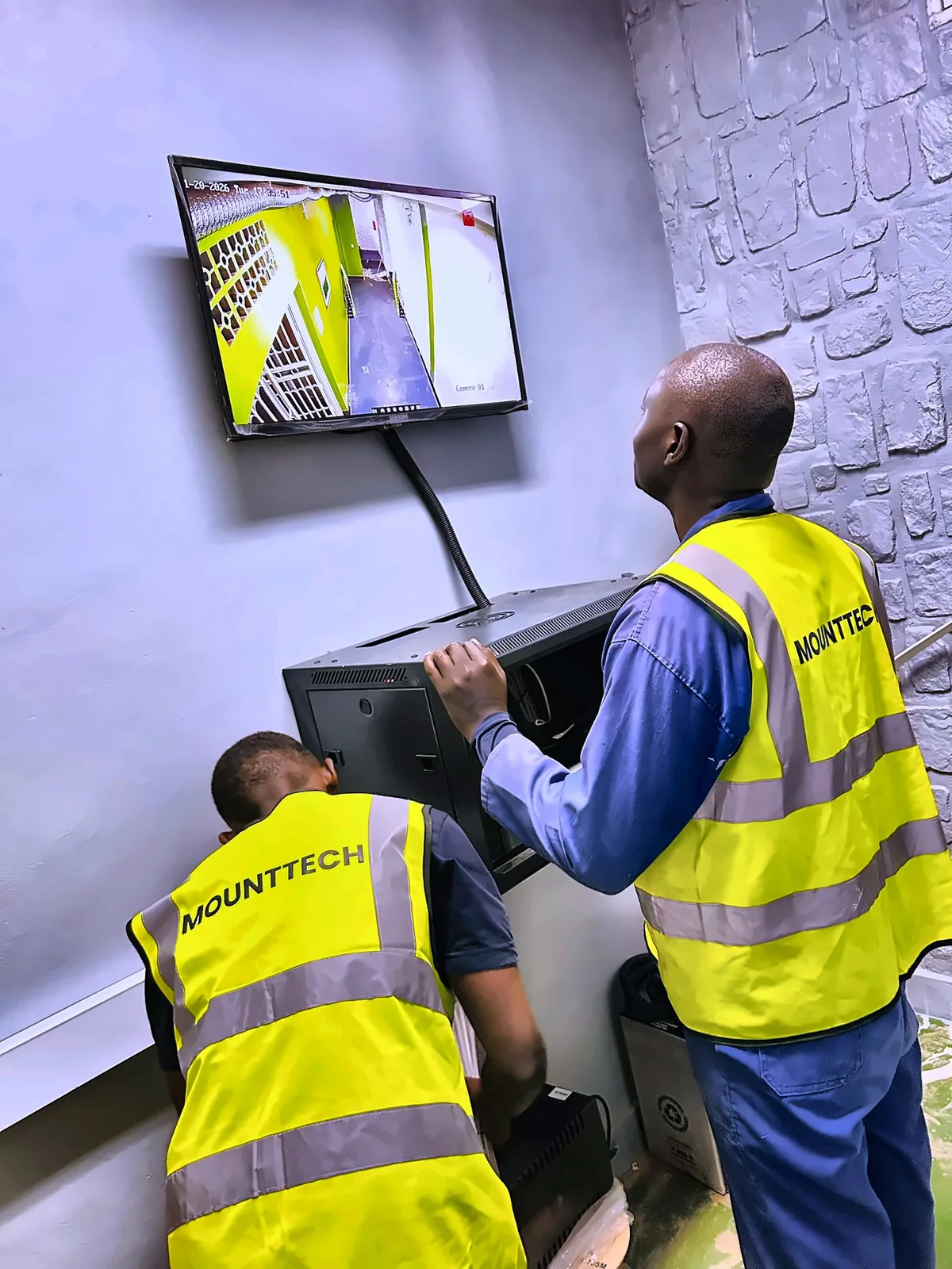 MountTech engineers installing CCTV cameras in Kigali Rwanda